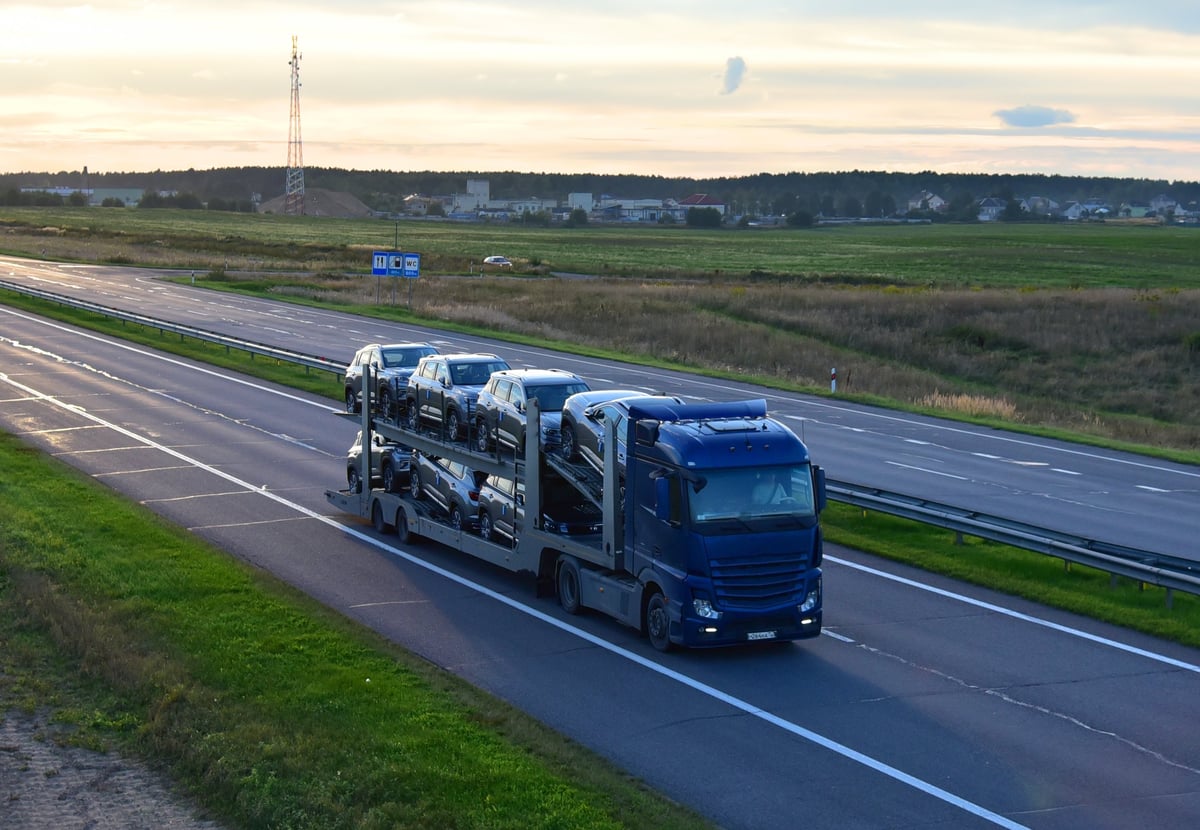 A car transporter hauling vehicles on a highway