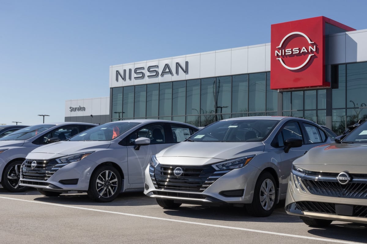 A vehicle being reviewed at a dealership for wholesale
